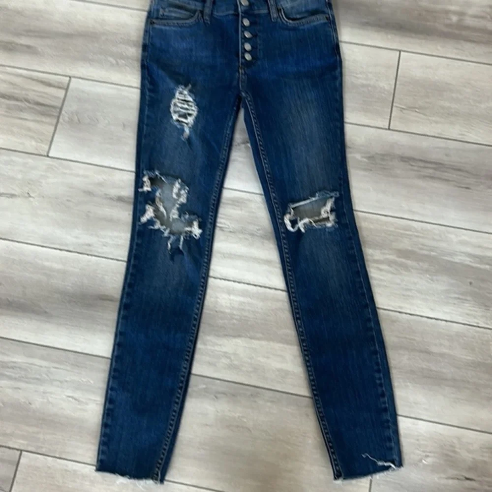 Free People size 25 busted knee button fly jeans